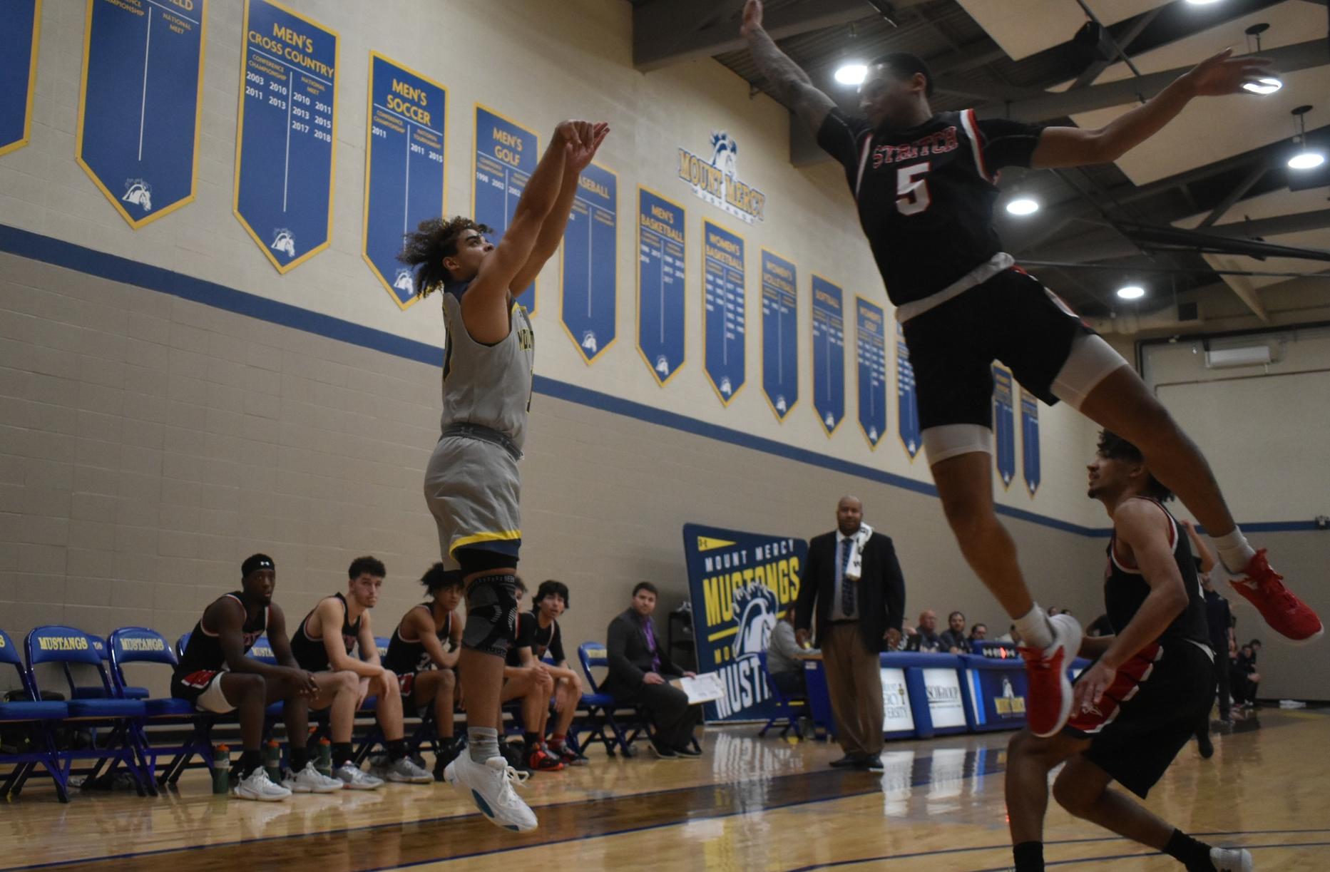 Hot-shooting Mustangs defeat Wolves
