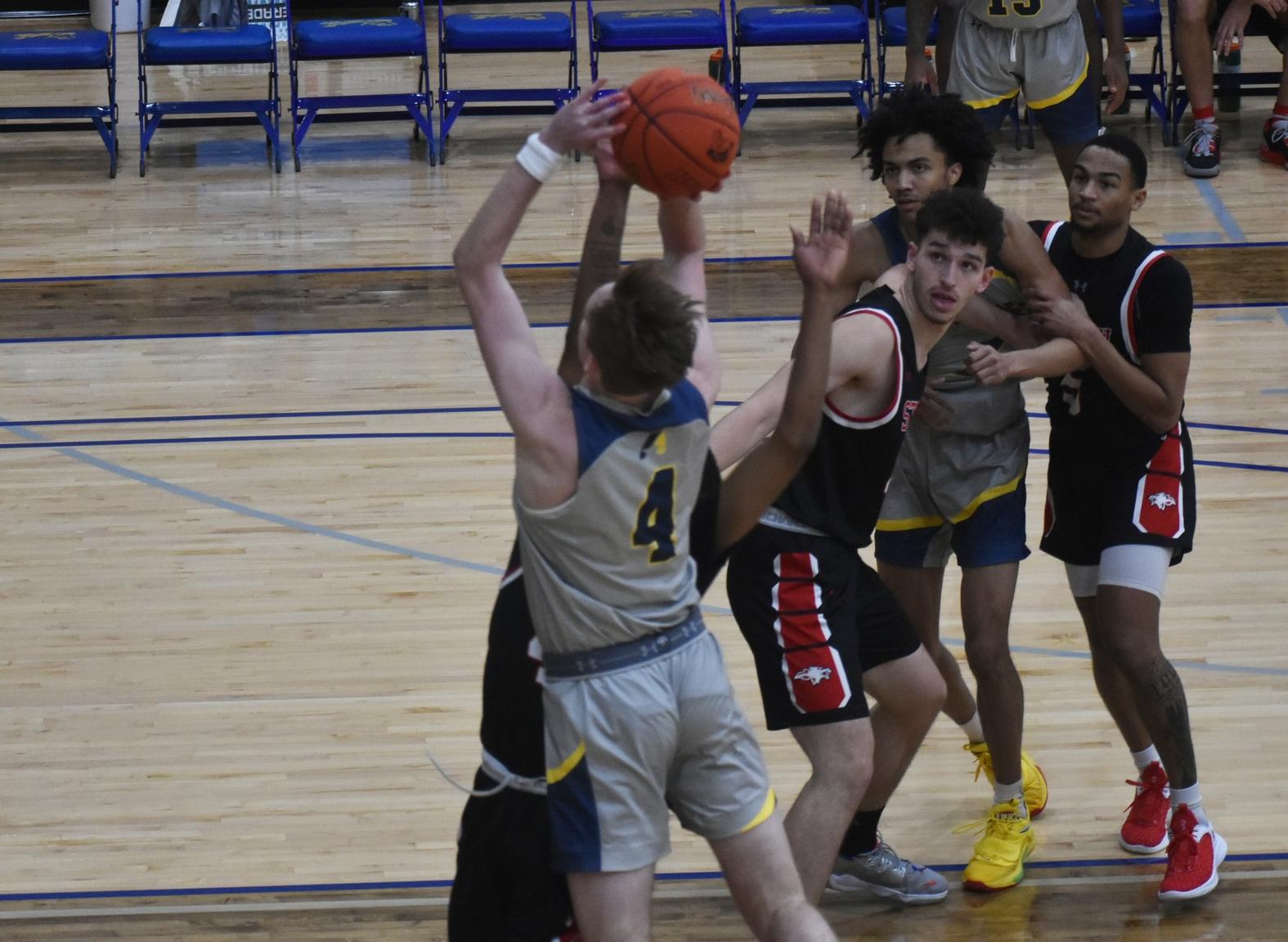 Eagles pull away late to down Mustangs