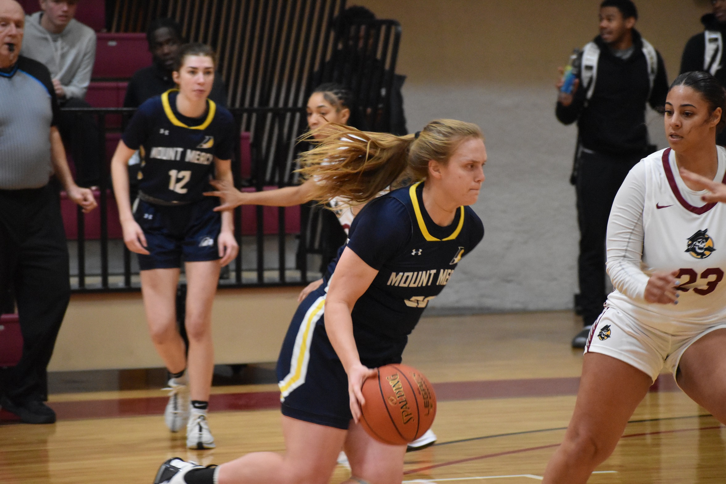 Headington Joins 1,000 Point Club Despite Falling to the Pirates